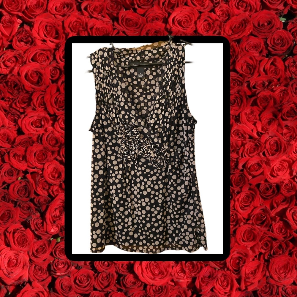 Light & comfortable polka dot sleeveless top.
